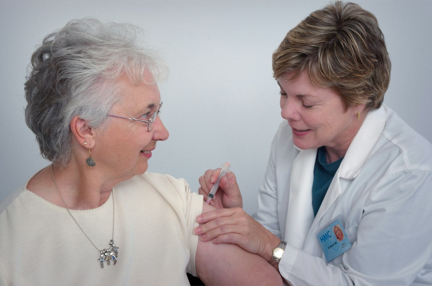 A clinician providing careful diagnostic care